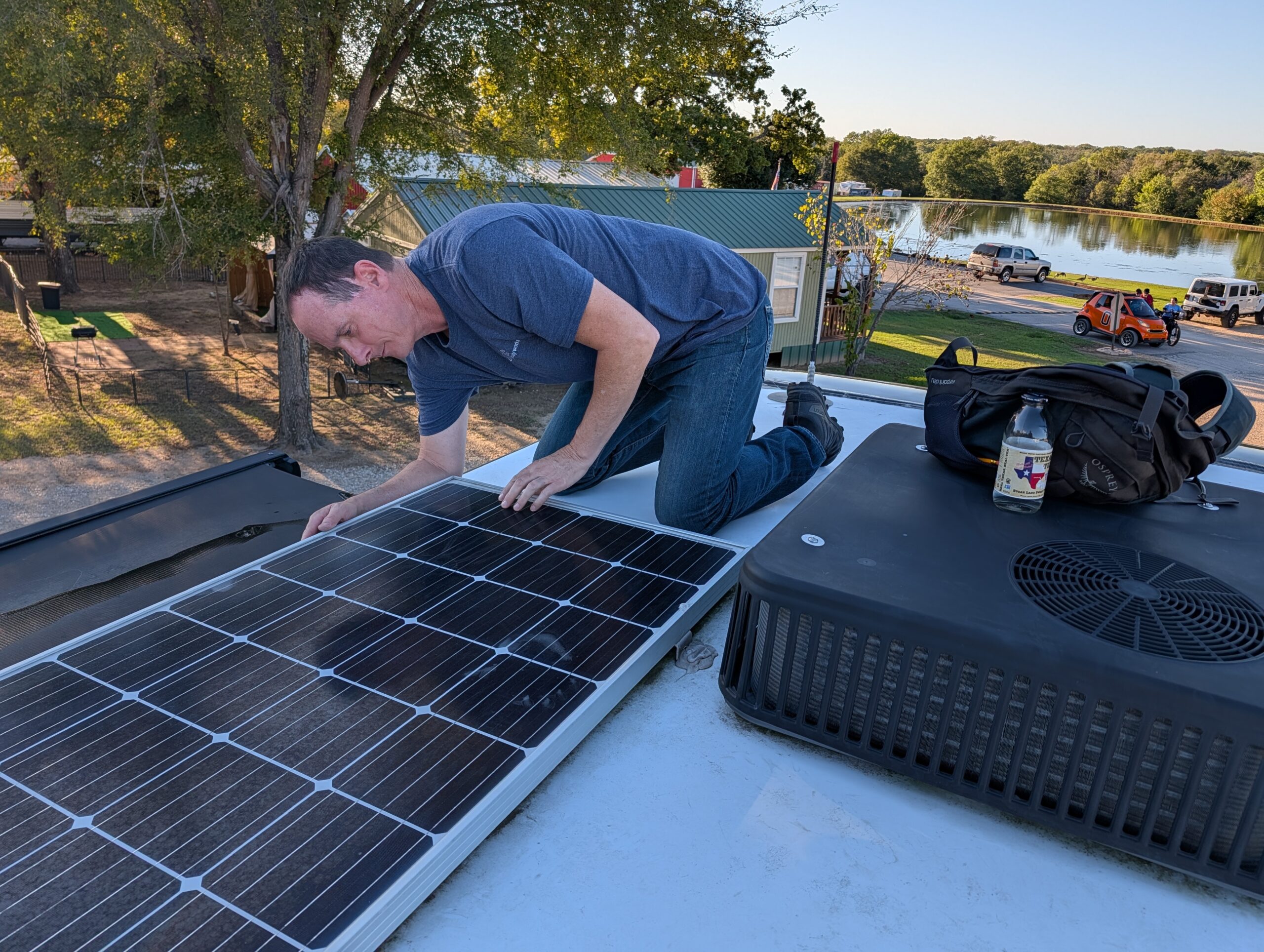 RV Tech inspecting a solar panel.
